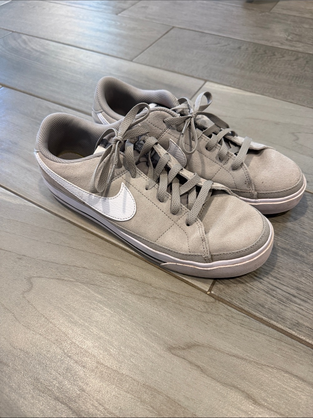 Nike Grey Low-Top Sneakers with White Swoosh